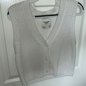 White sweater vest